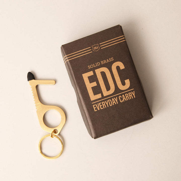 brass edc no touch tool by izola 1