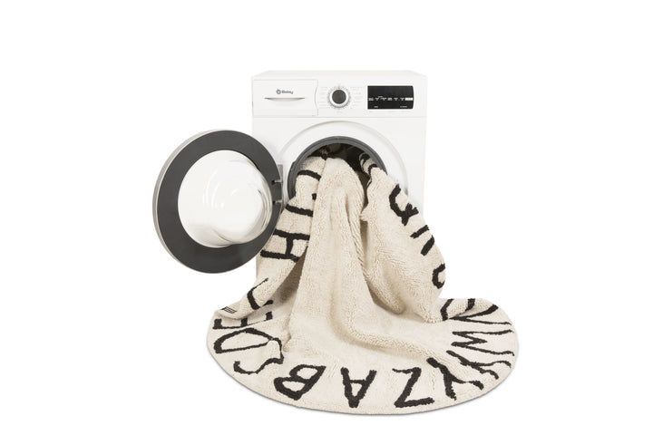 Round ABC Rug in Natural & Black design by Lorena Canals