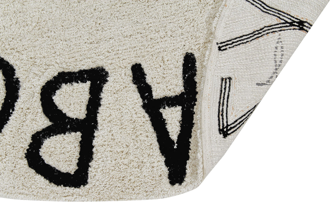 Round ABC Rug in Natural & Black design by Lorena Canals