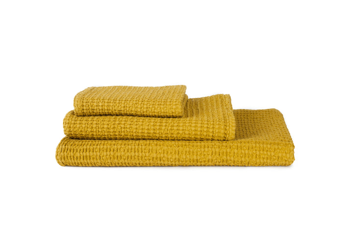 simple waffle towel in various colors design by hawkins new york 5