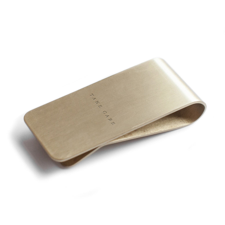 take care money clip design by izola 1