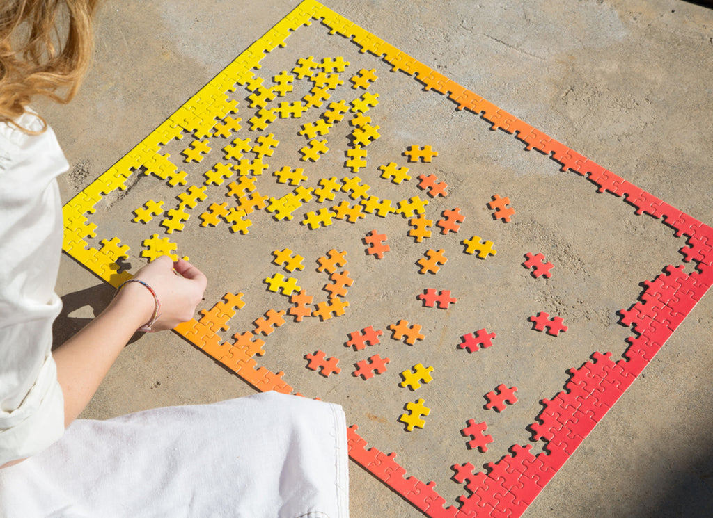 Gradient Puzzle in Red & Yellow design by Areaware